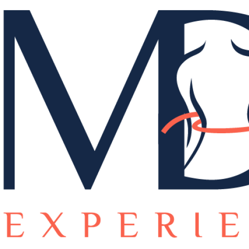 Logo with large 'M' and a stylized dog face, accompanied by 'EXPERIE' text.